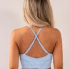Four blue sports bra back